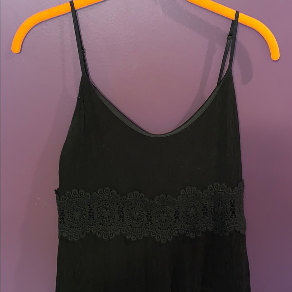 Black romper with lace band around the waist